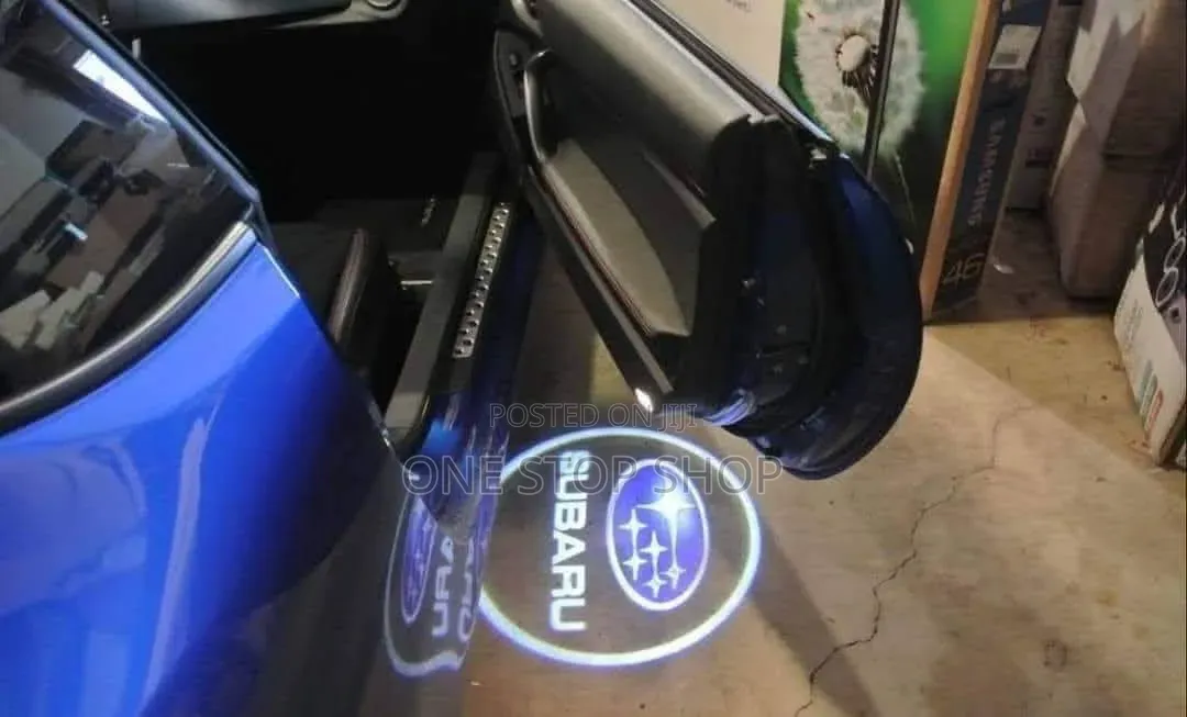 2pc Subaru Door Protector Light With Clear Vibrantlogo Image on Ground
