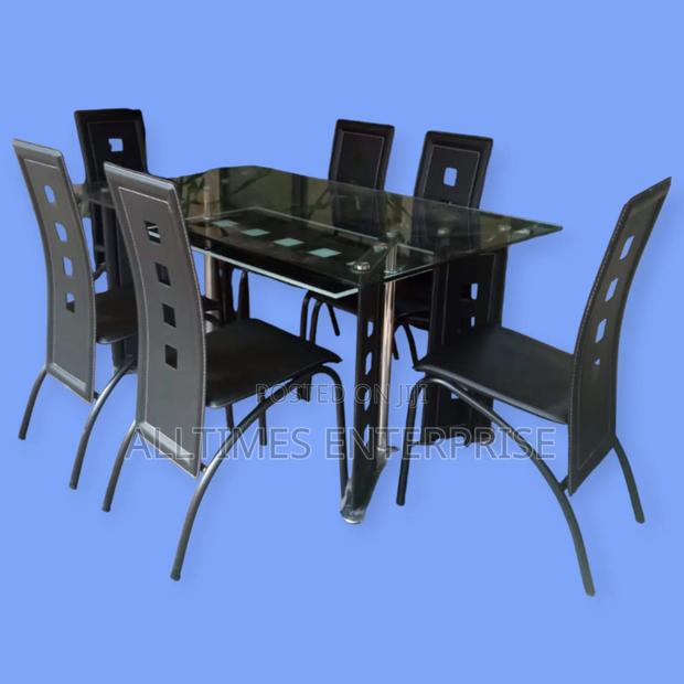 Executive 6 Sitter Glass Dinning Table With Leather Seat