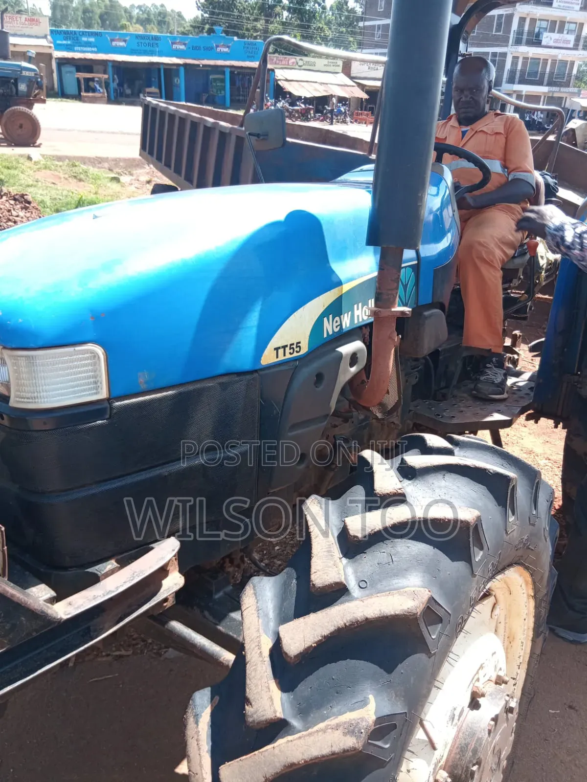 Tractor Tt 55 Four Wheel With Plough