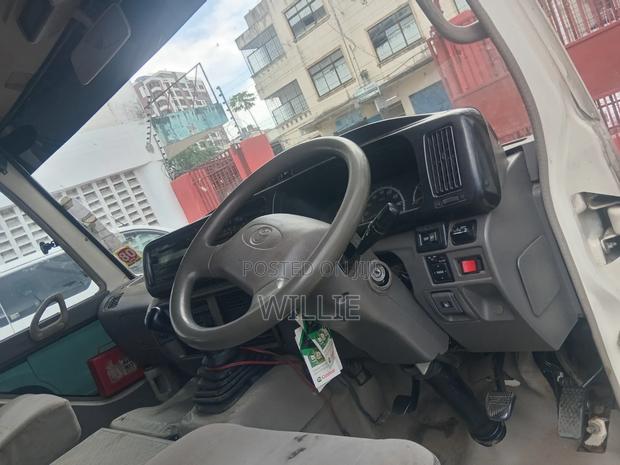 Toyota Coaster 2015 White - thumbnail 5