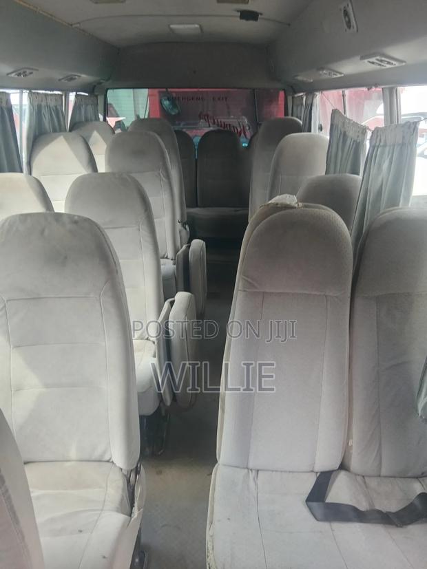 Toyota Coaster 2015 White - thumbnail 9