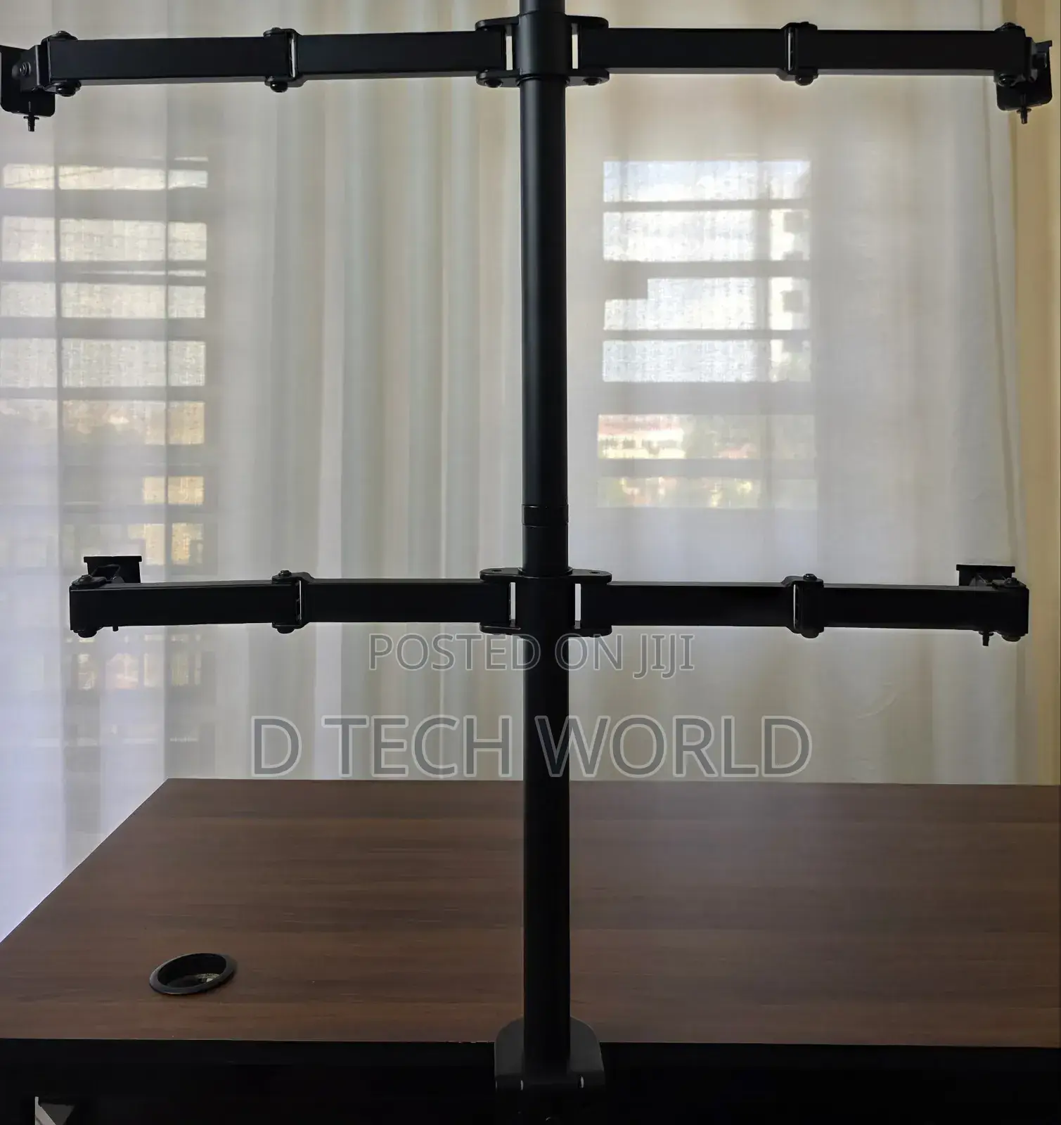 Quad Monitor Stand 
Supports 24 and 27 Inch 
Height Adjustable