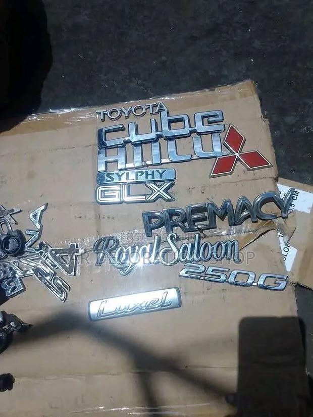 Assorted Automotive Emblems in Different Prices