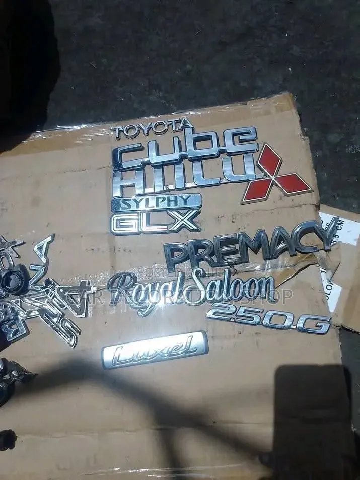 Assorted Automotive Emblems in Different Prices