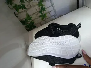Black and White Unisex Sporty Kids Sizes 26 to 30