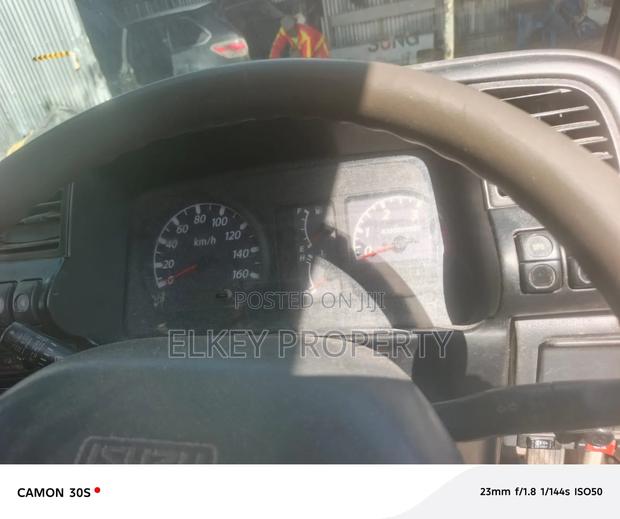 Isuzu NKR 2013 White - thumbnail 9