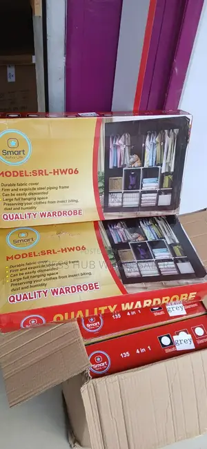 Portable Wardrobe With a Fabric Cover and Steel Piping Frame.