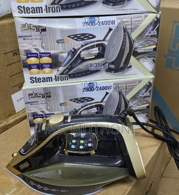 DSP Kd1364 Gold and Black Steam Iron With a Color Led Display.