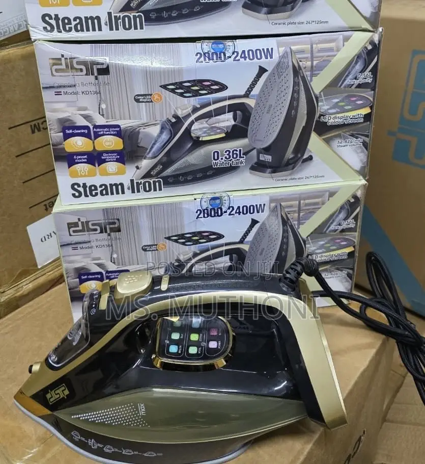 DSP Kd1364 Gold and Black Steam Iron With a Color Led Display.