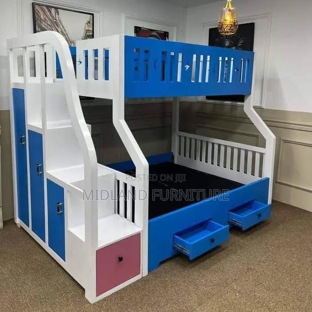Blue and Pink Kids Bunk Bed With Storage Staircase