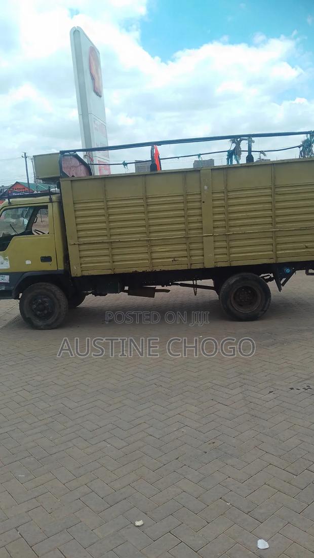 Mitsubishi Canter 1991 Yellow - thumbnail 4
