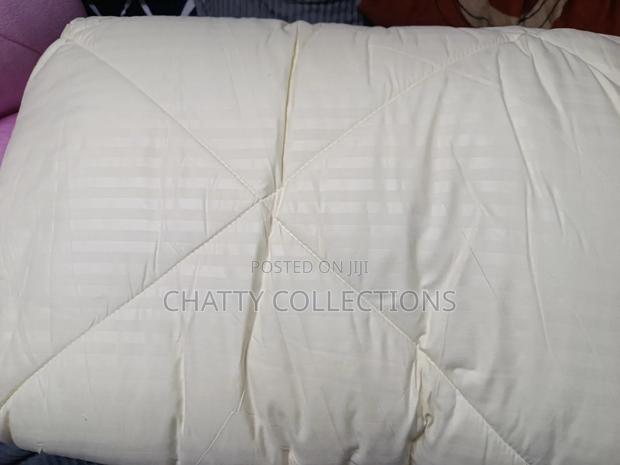 Cream 6 by 7 Stripped Binded Duvet With Bedsheets