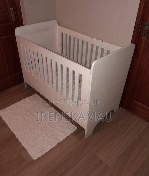 White Wooden Baby Cot