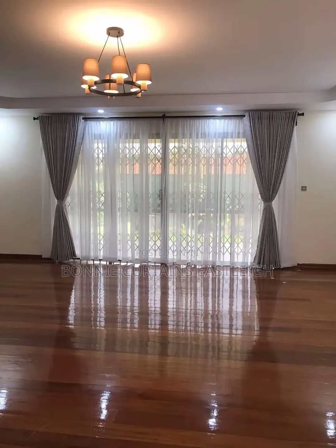 Cream Curtains With Rings and White Sheers
