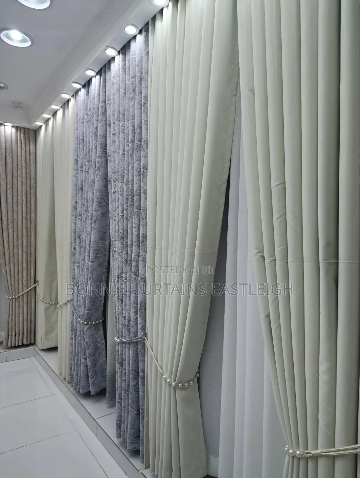 Cream Curtains With Rings and White Sheers