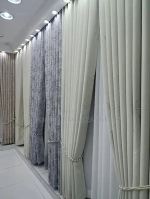 Cream Curtains With Rings and White Sheers