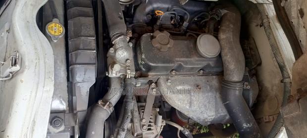 Nissan Caravan (Urvan) 2005 White - thumbnail 3