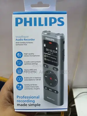 This Is a Philips Voicetracer Dvt2075 Audio Recorder in Silver.