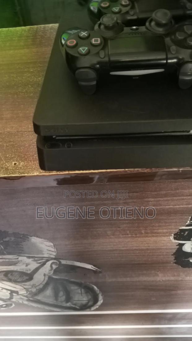 Ps4 Slim Chipped With 5 Games - thumbnail 2