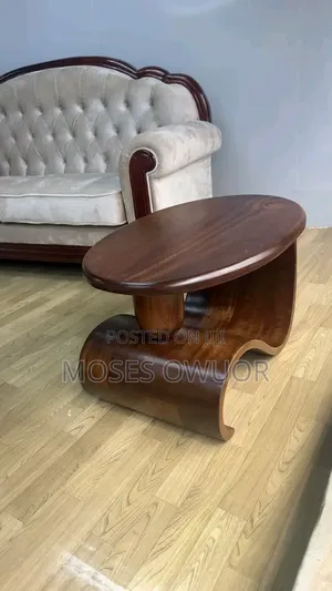 Waved Coffee Table With a Set of 7 Seater Button Sofer