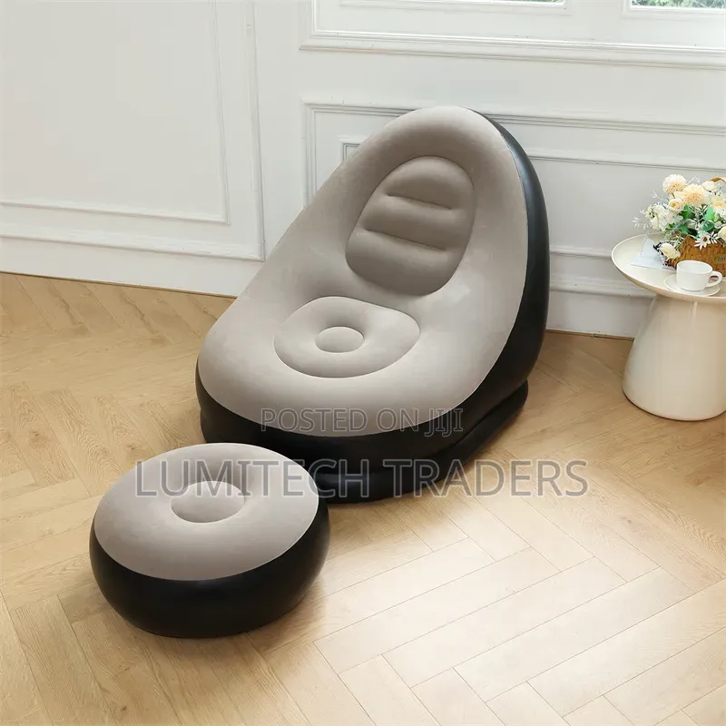 Inflatable Lounge Seat With Foot Rest and a Pump