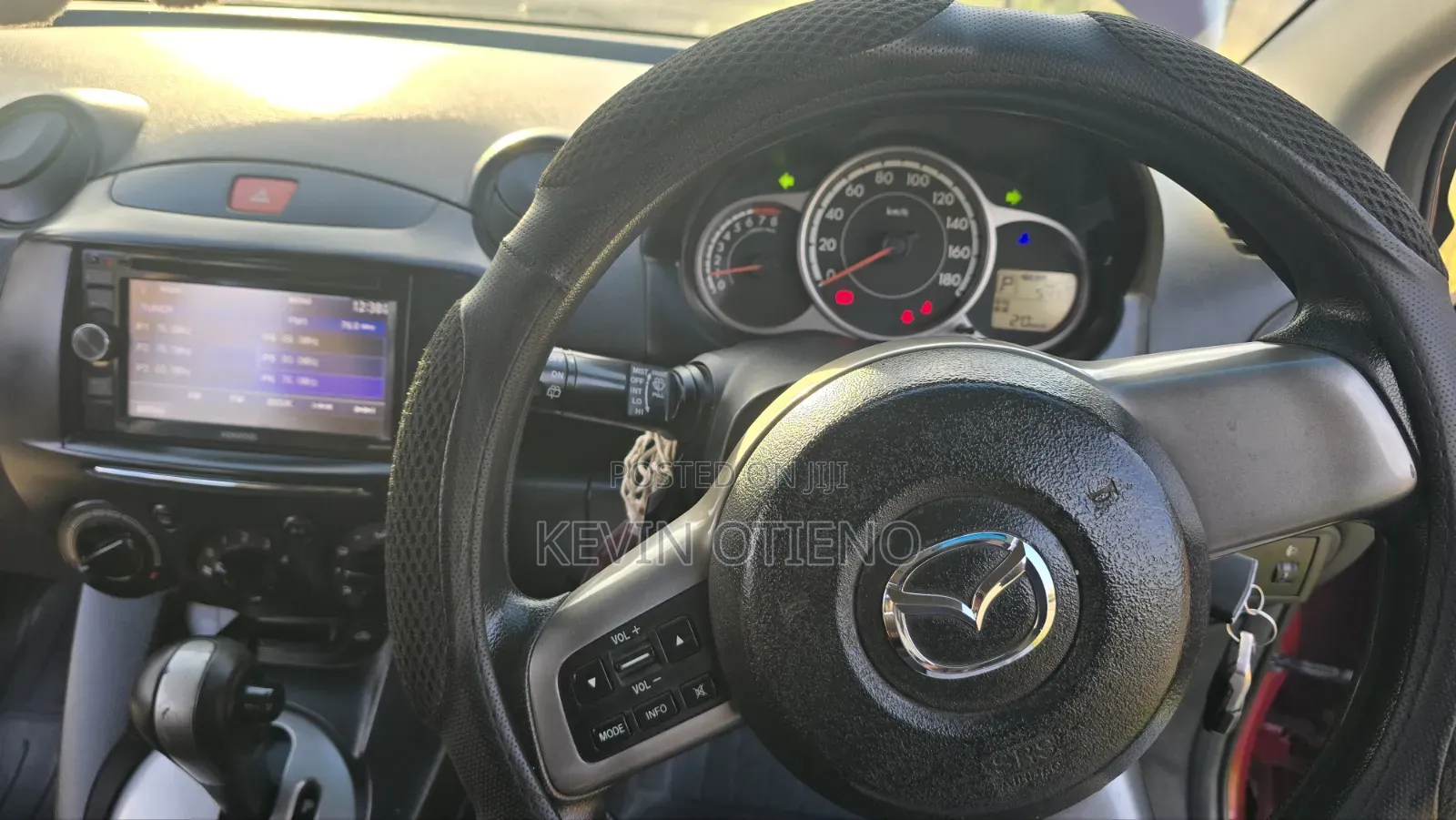 Mazda Demio 2012 Maroon