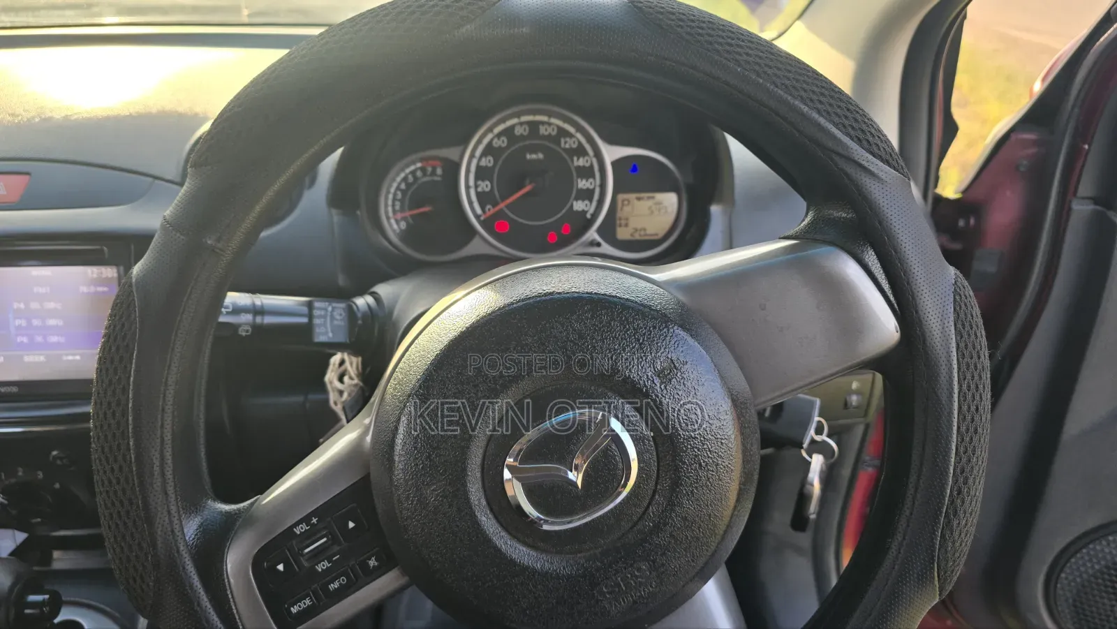 Mazda Demio 2012 Maroon