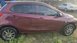 Mazda Demio 2012 Maroon
