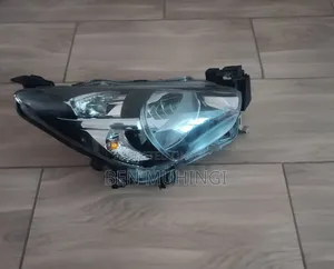 Mazda Demio Headlight