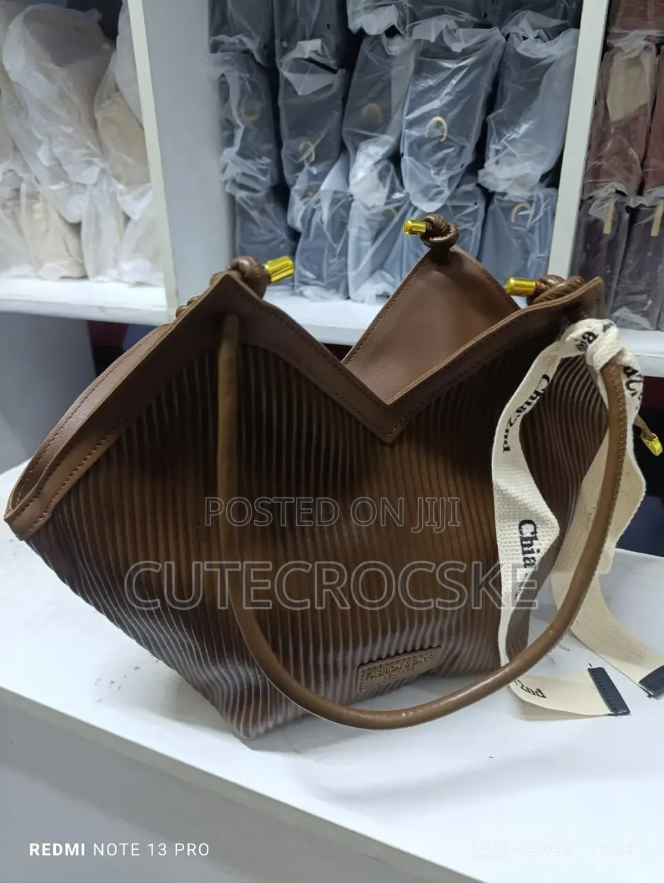 Elegant Black Peated Handbag