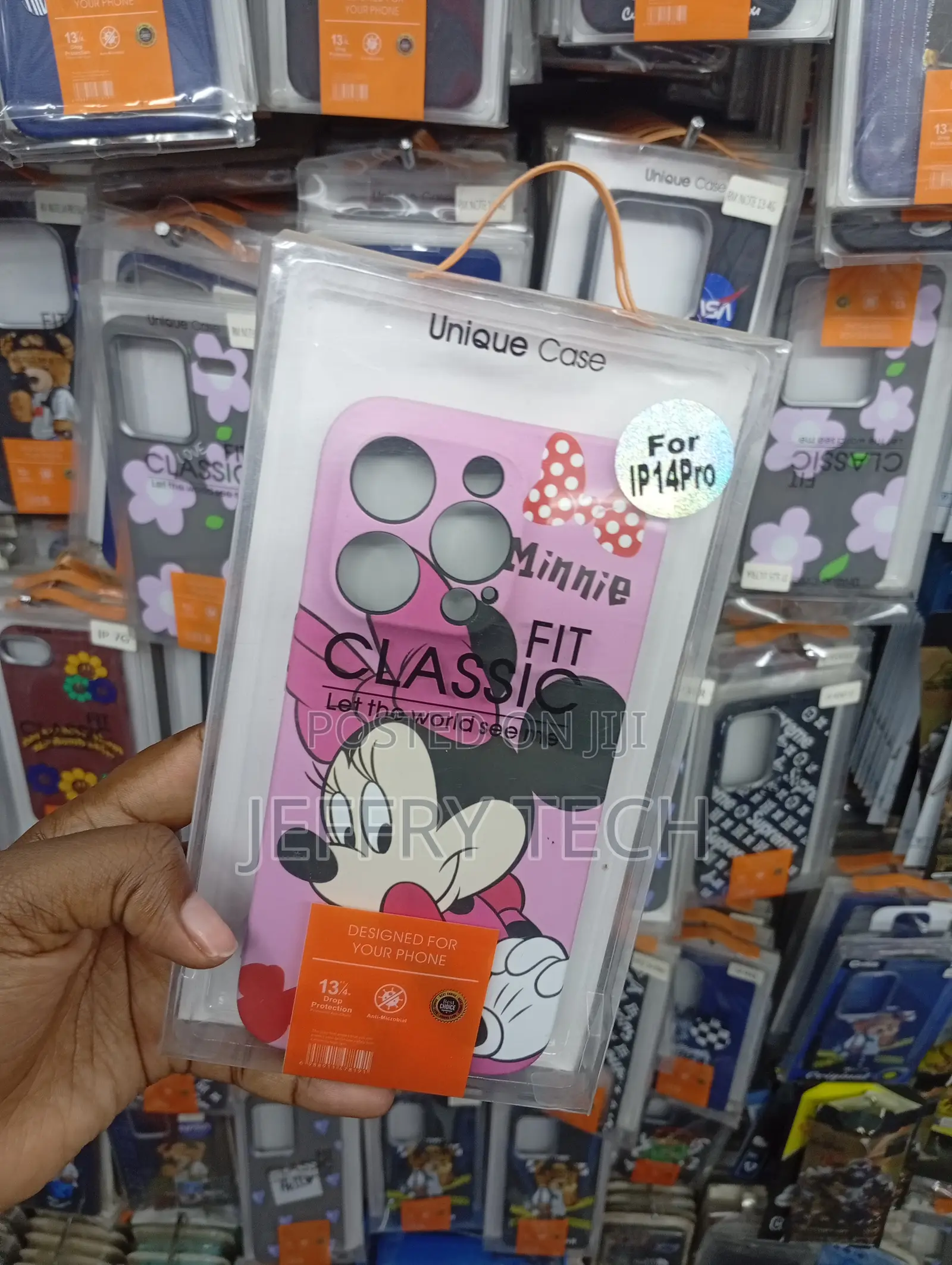 Pink Case Brand Disney Minnie Mouse Phone Case for an iPhone 14 Pro.