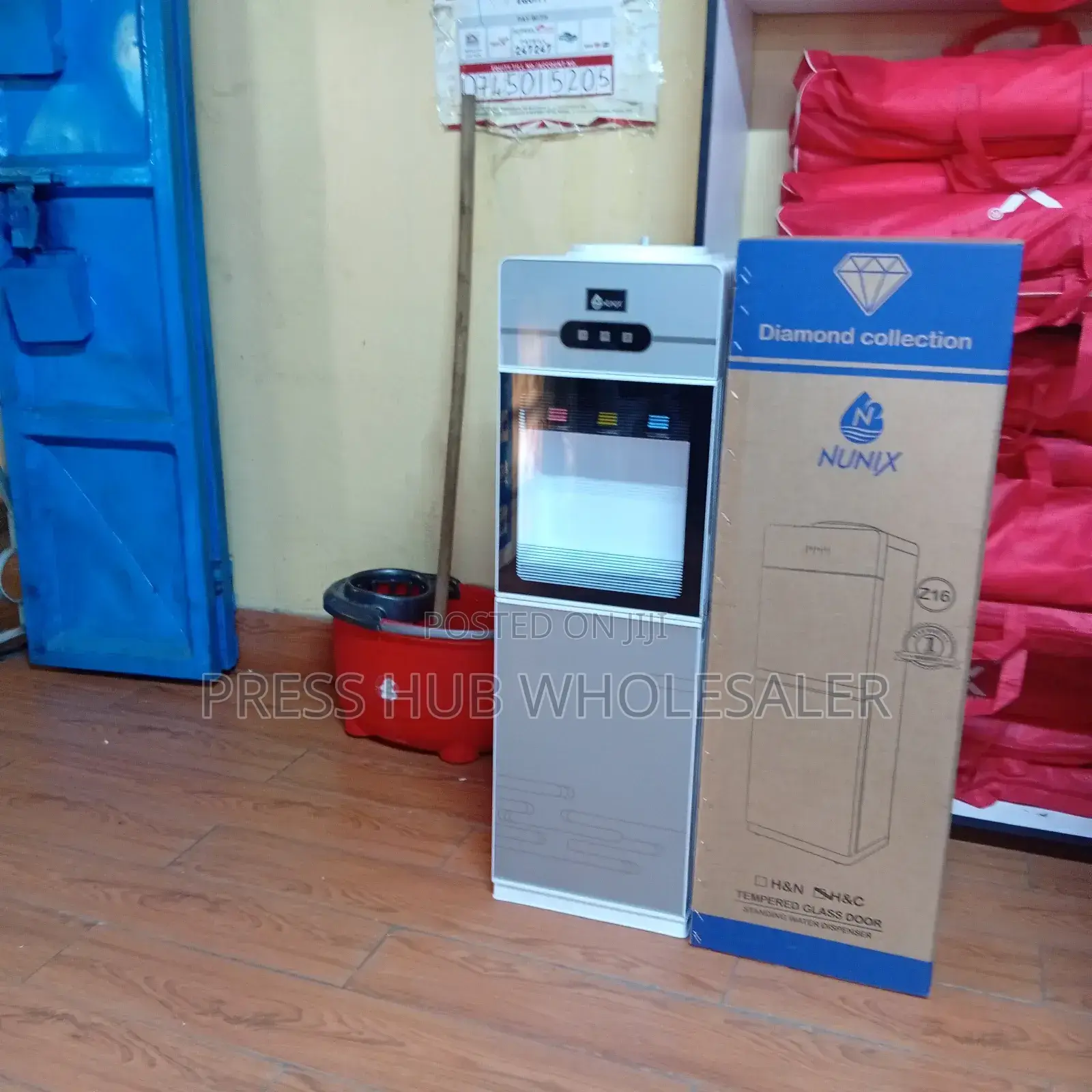 Nunix Z16c Standing Water Dispenser Featuring a Tempered Glass Door.