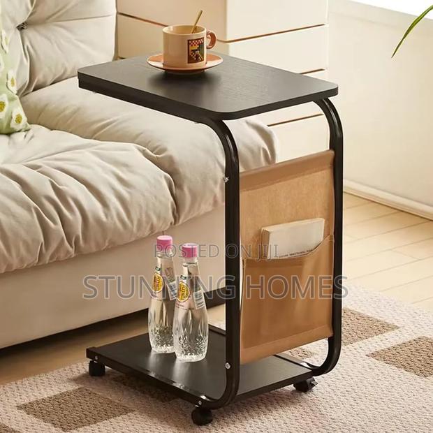 Movable Side Table With a Storage Pocket