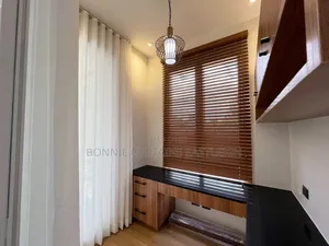 Gold Curtains and White Sheers With Hooks