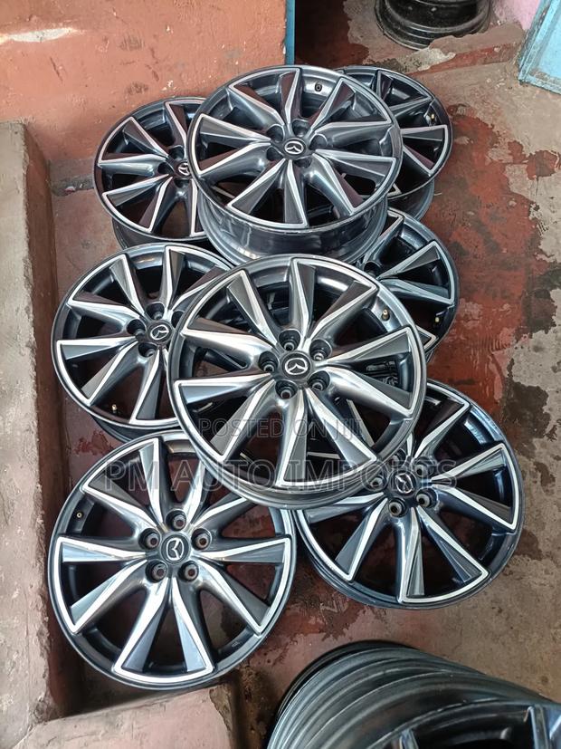 Original Mazda Rims - thumbnail 2