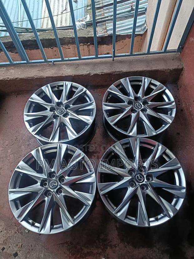 Original Mazda Rims - thumbnail 3