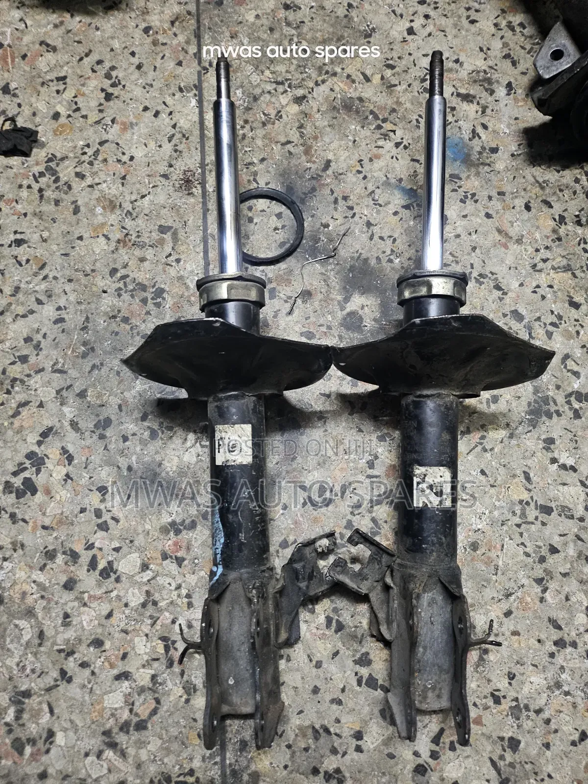 Nissan Y12 Front Shocks