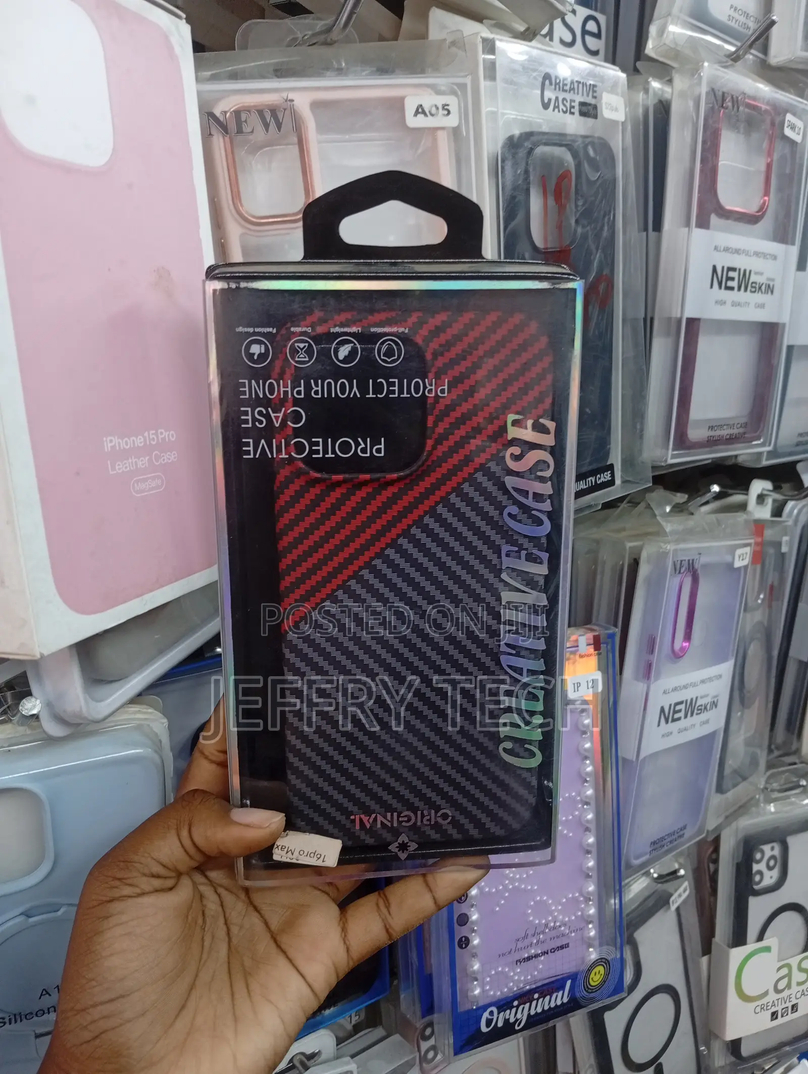 iPhone 16 Pro Max Red and Black Carbon Fiber Style Texture Cover