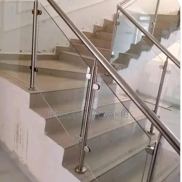 Chrome Piped Hand Rail Staircase With Glass Balustrade - thumbnail 2