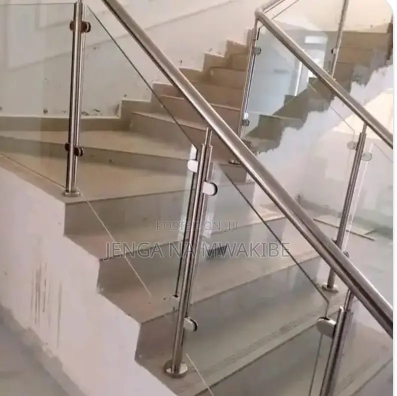 Chrome Piped Hand Rail Staircase With Glass Balustrade