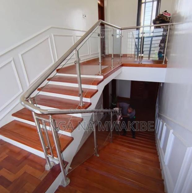 Chrome Piped Hand Rail Staircase With Glass Balustrade - thumbnail 3