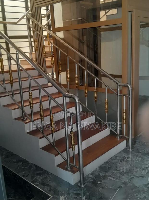 Chrome Piped Hand Rail Staircase With Glass Balustrade - thumbnail 4