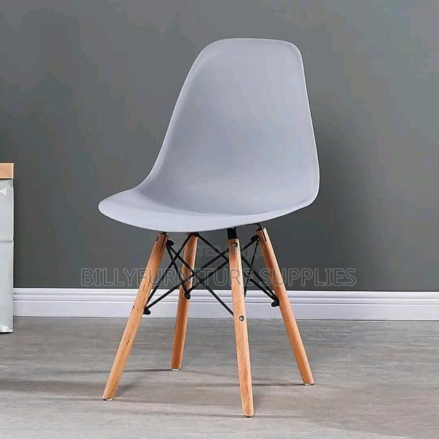 Modern Plastic Dining Chair in Nairobi – Wooden Legs Eames Style