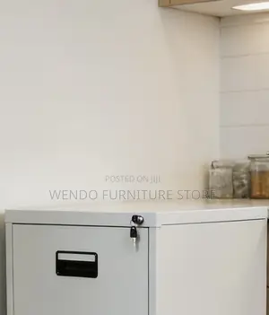 Office Cabinet; Four Drawered Steel Gray Office Filing Cabinet