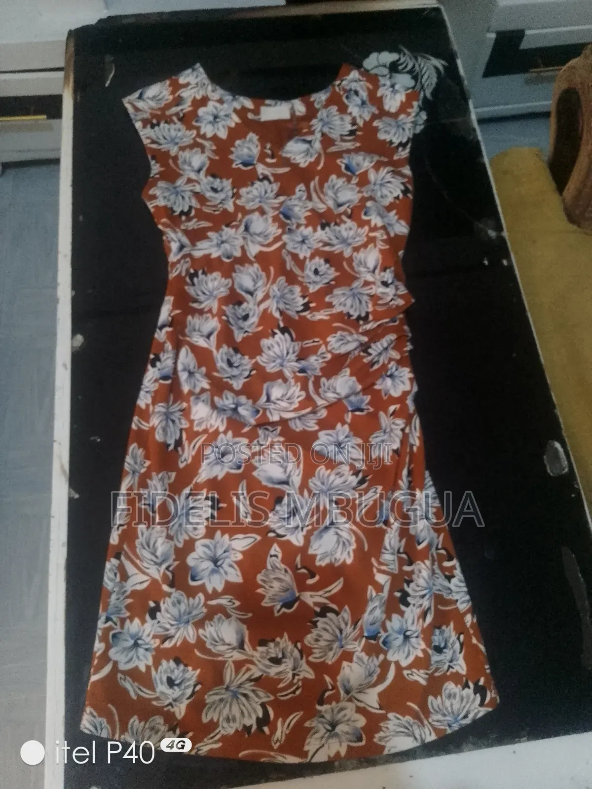 Medium Sized Brown Dress With Colourful Flower Patterns