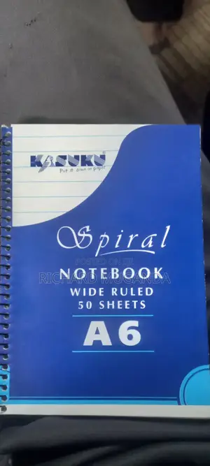 A Spiral Notebook Wide Rules 50 Sheets