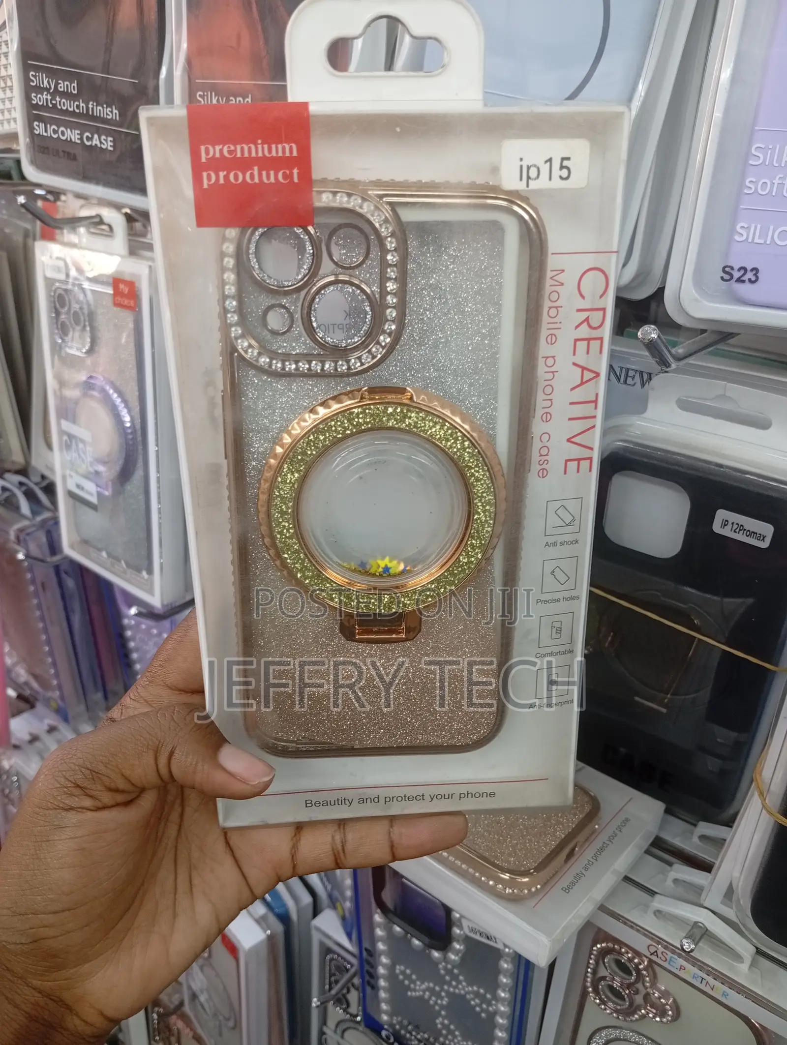 Gold Plated iPhone 15 Case Featuring a Rhinestone Camera Border