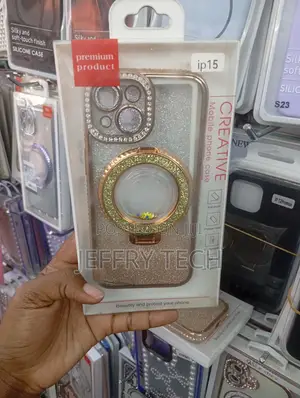 Gold Plated iPhone 15 Case Featuring a Rhinestone Camera Border