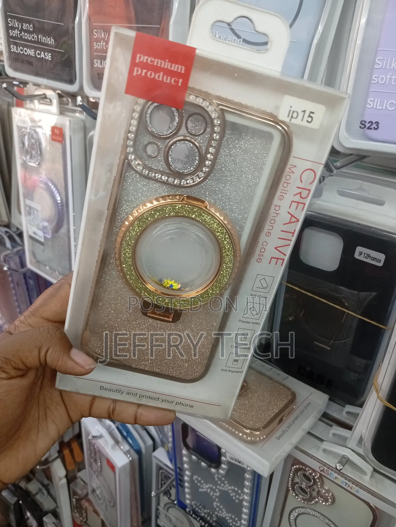 Gold Plated iPhone 15 Case Featuring a Rhinestone Camera Border