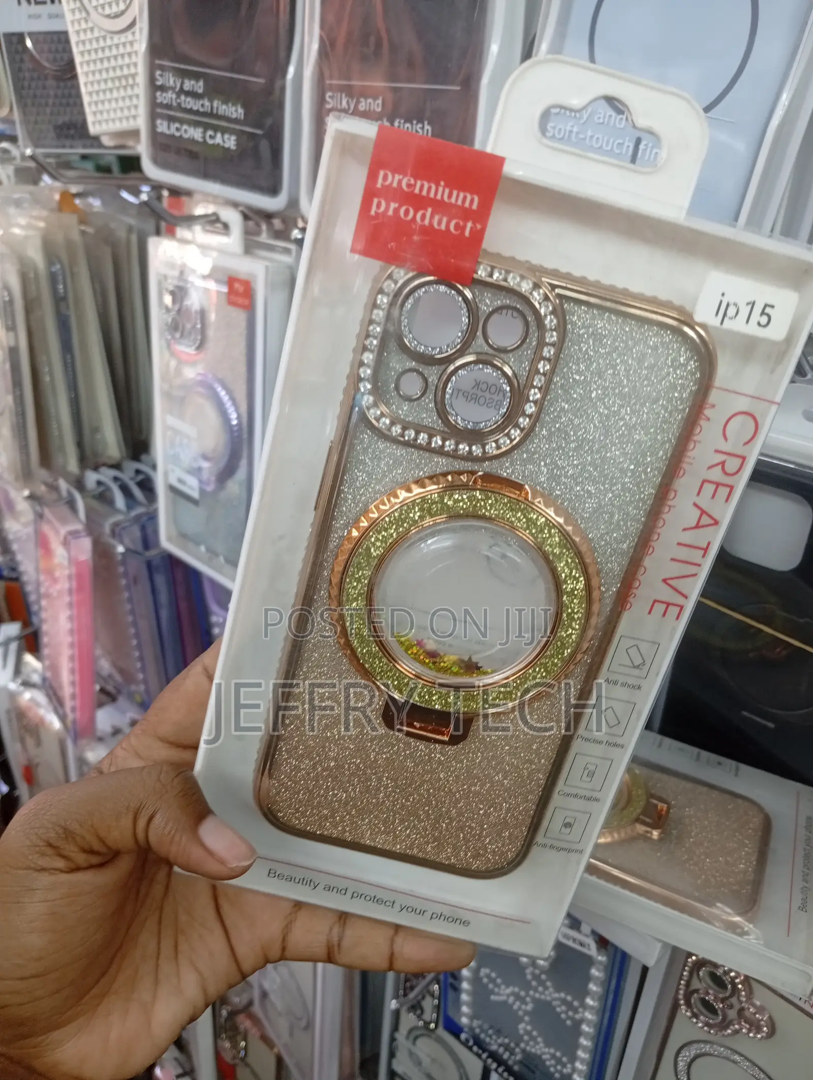 Gold Plated iPhone 15 Case Featuring a Rhinestone Camera Border